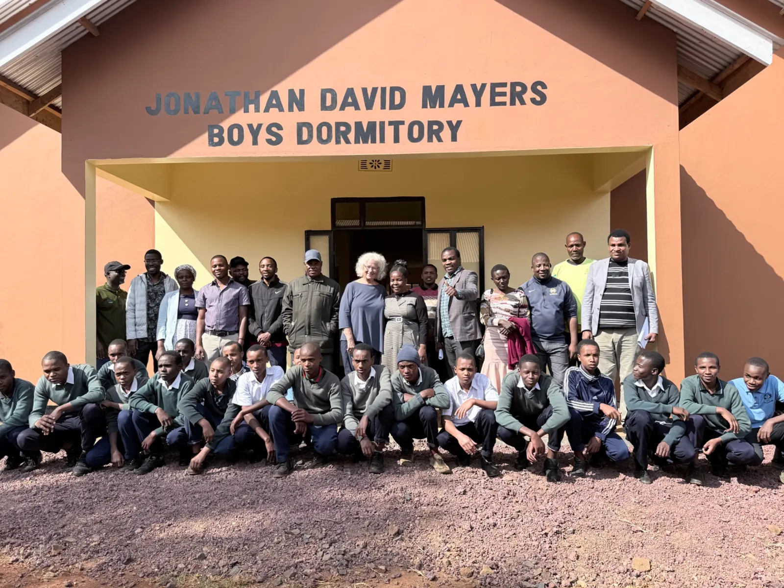 Students and community supporters at Jonathan David Mayers Boys Dormitory in Tanzania